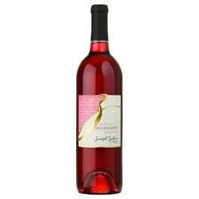 ZAKON MUSCATINI RED 750ML is a vibrant red wine that showcases aromatic notes of ripe berries
